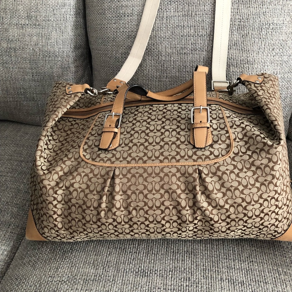 Natural colored Coach carry on.